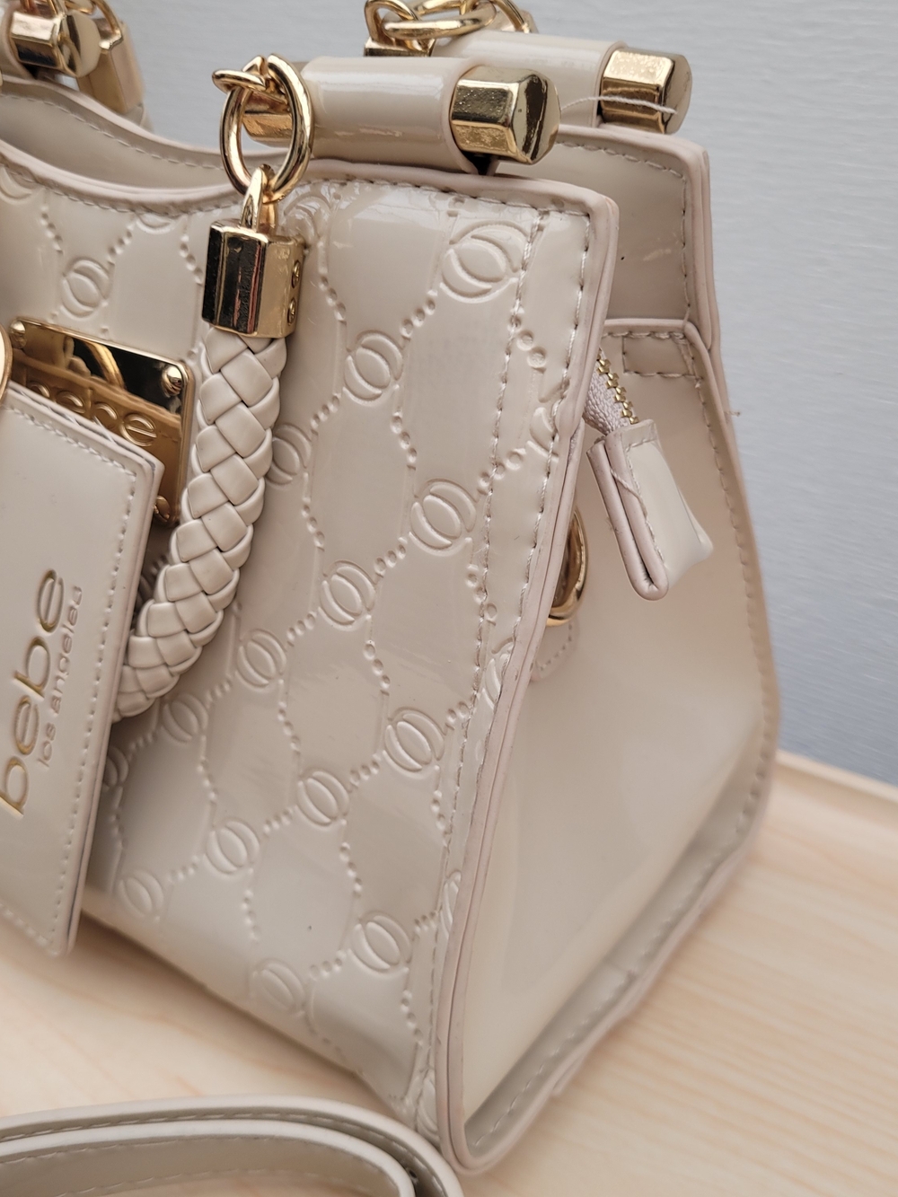 Bebe Cream Embossed Satchel Crossbody Bag – Gold Hardware
Elegant Bebe handbag - Picture 4 of 13